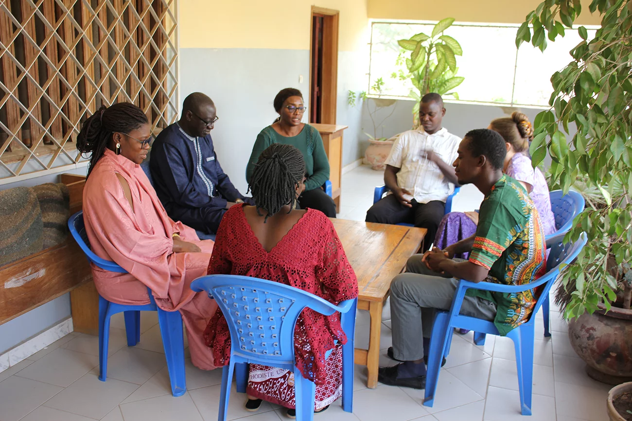 The Wolof team prays together.jpg